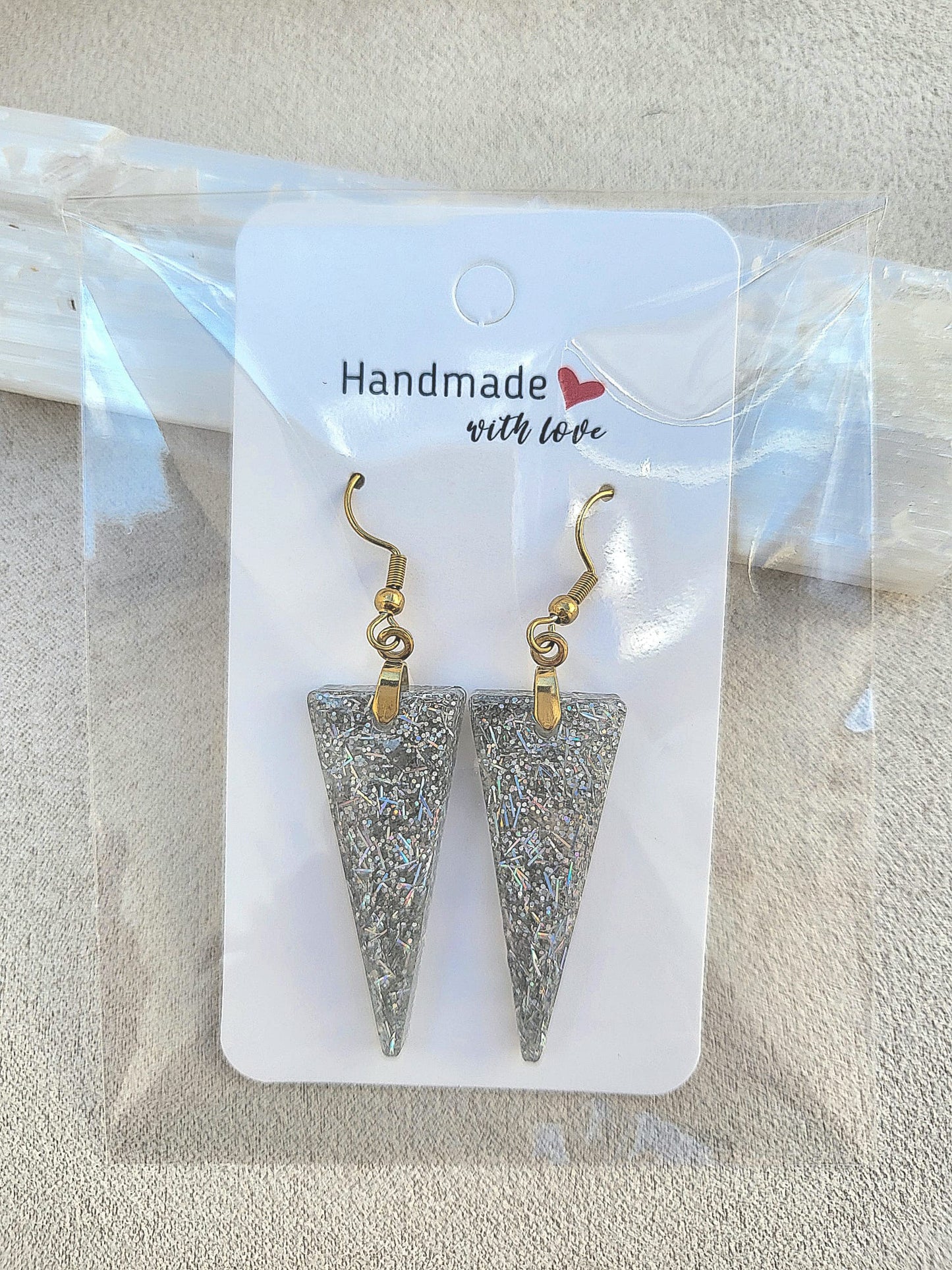 BRILLO DE TRIANA earrings.