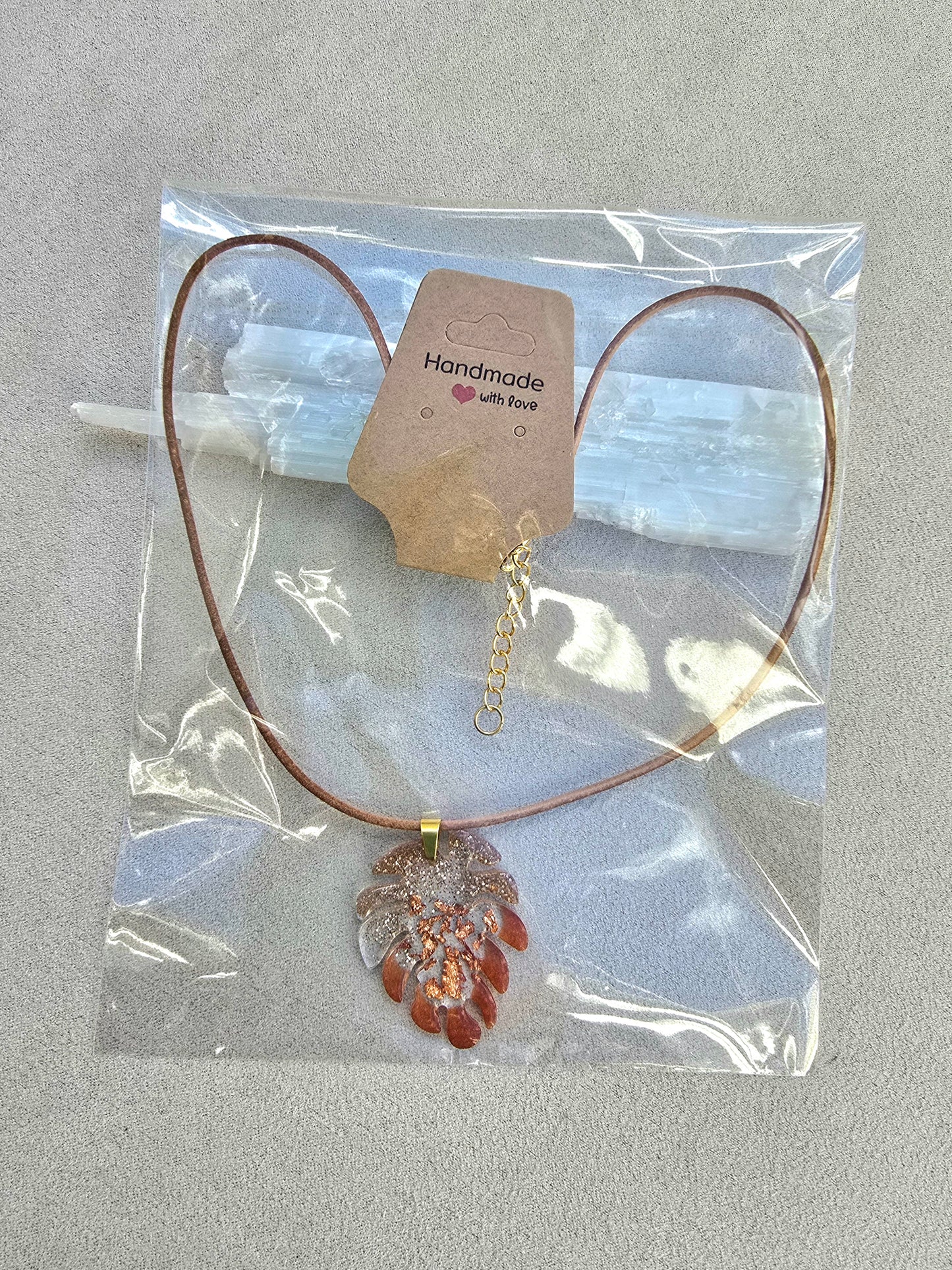 MONSTERA ROSE GOLD pendant.