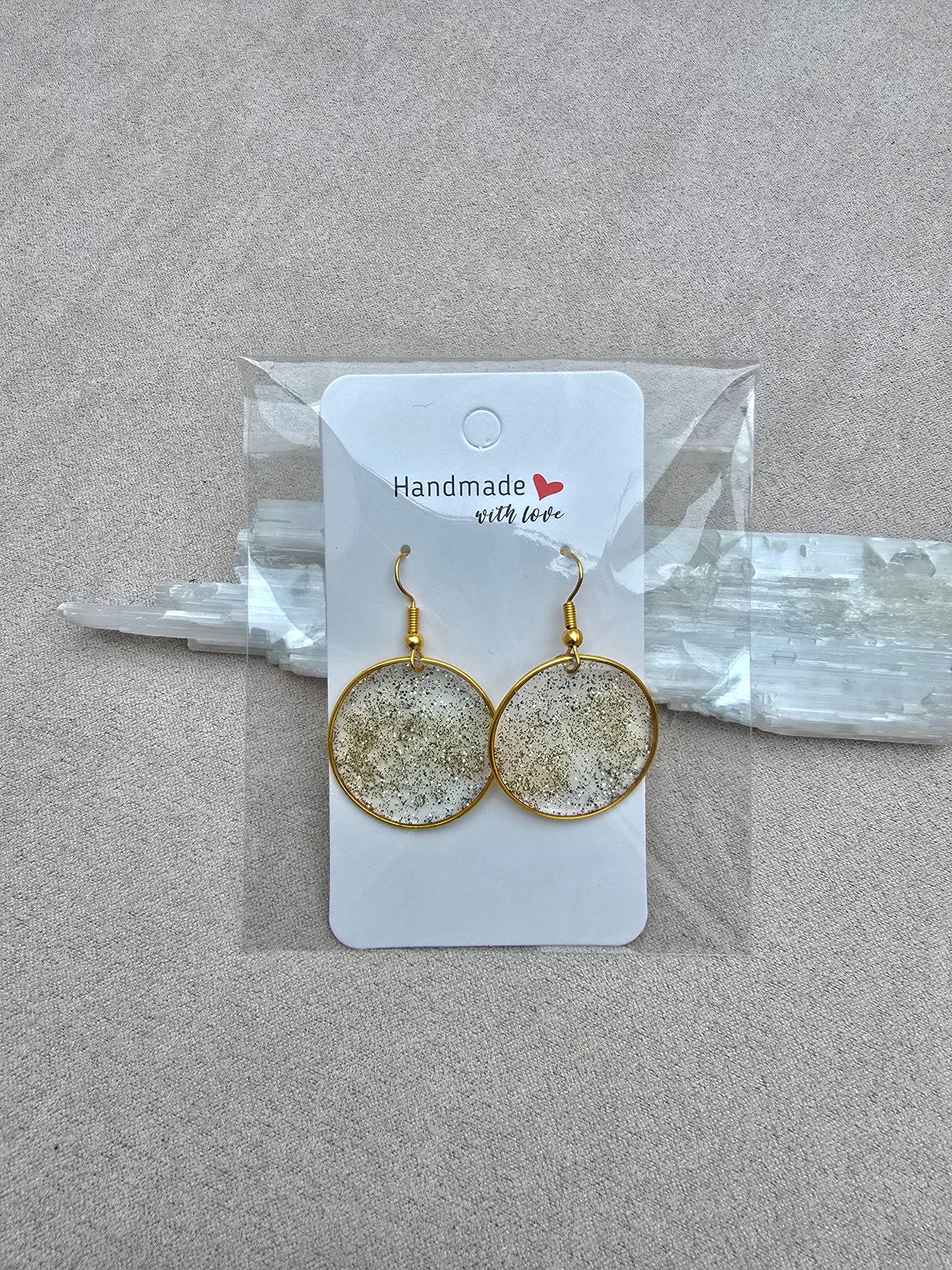 SUBTLE SHINE earrings.