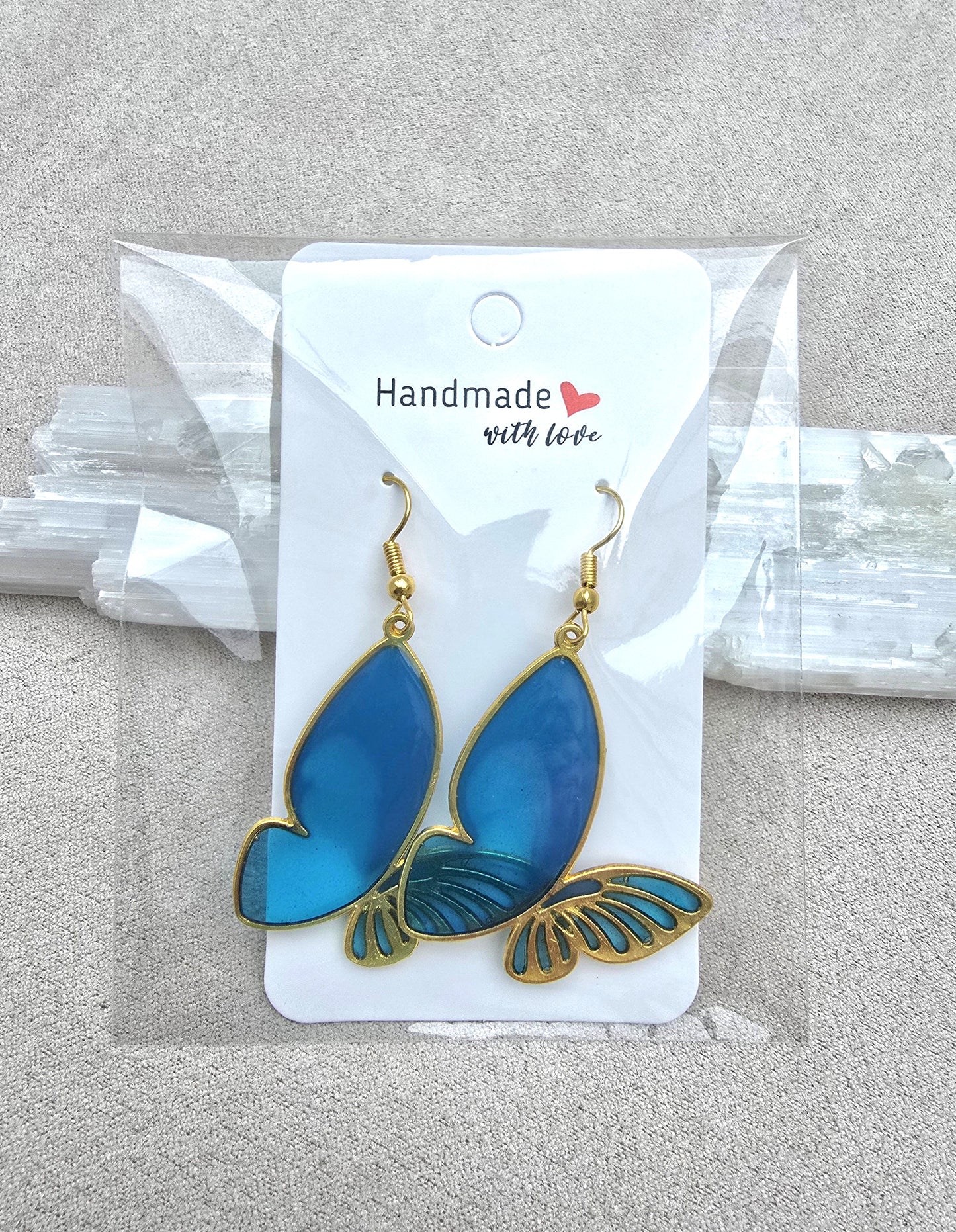 BLUE BUTTERFLY earrings.