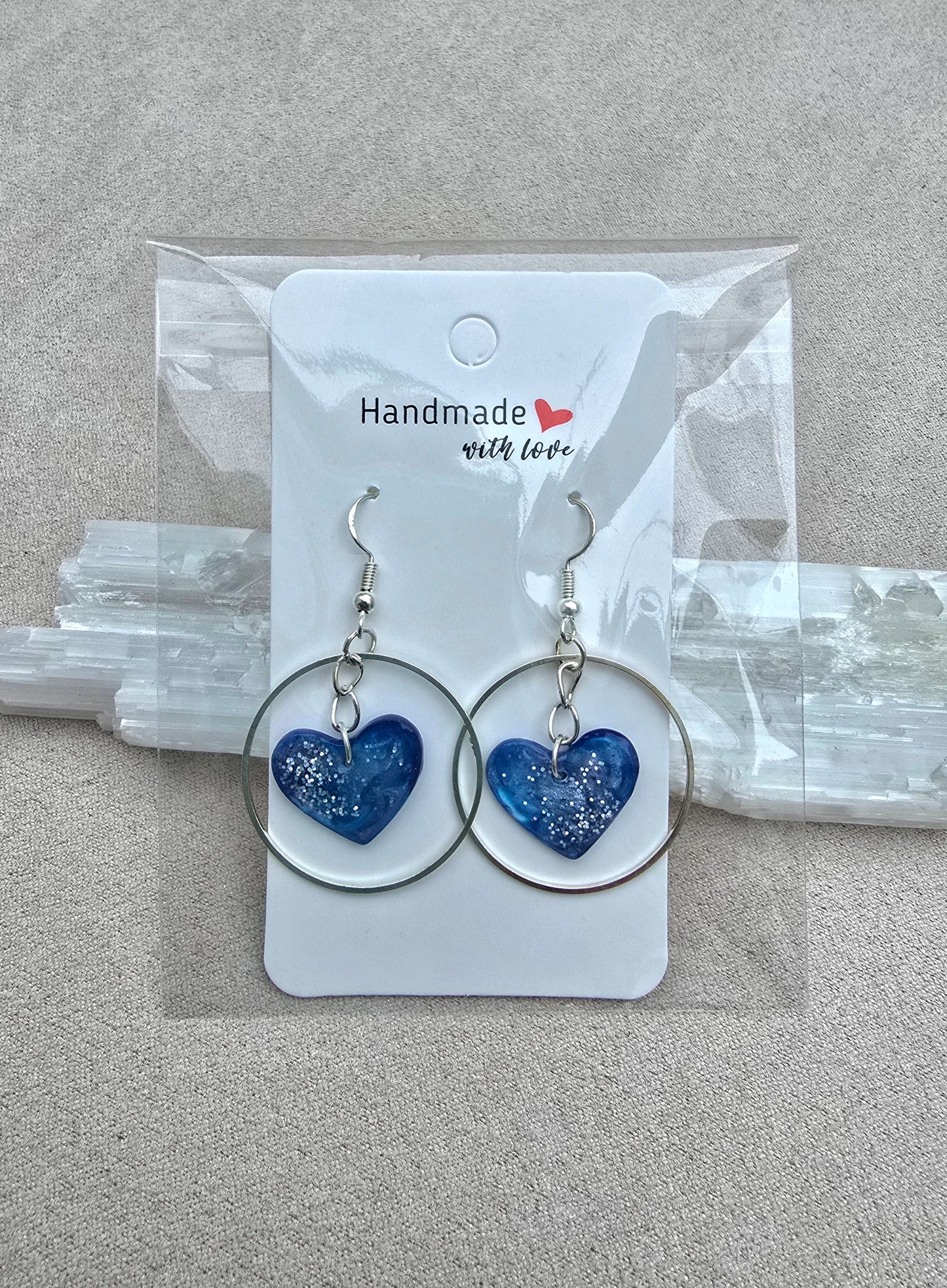 HEARTS IN ORBIT earrings.