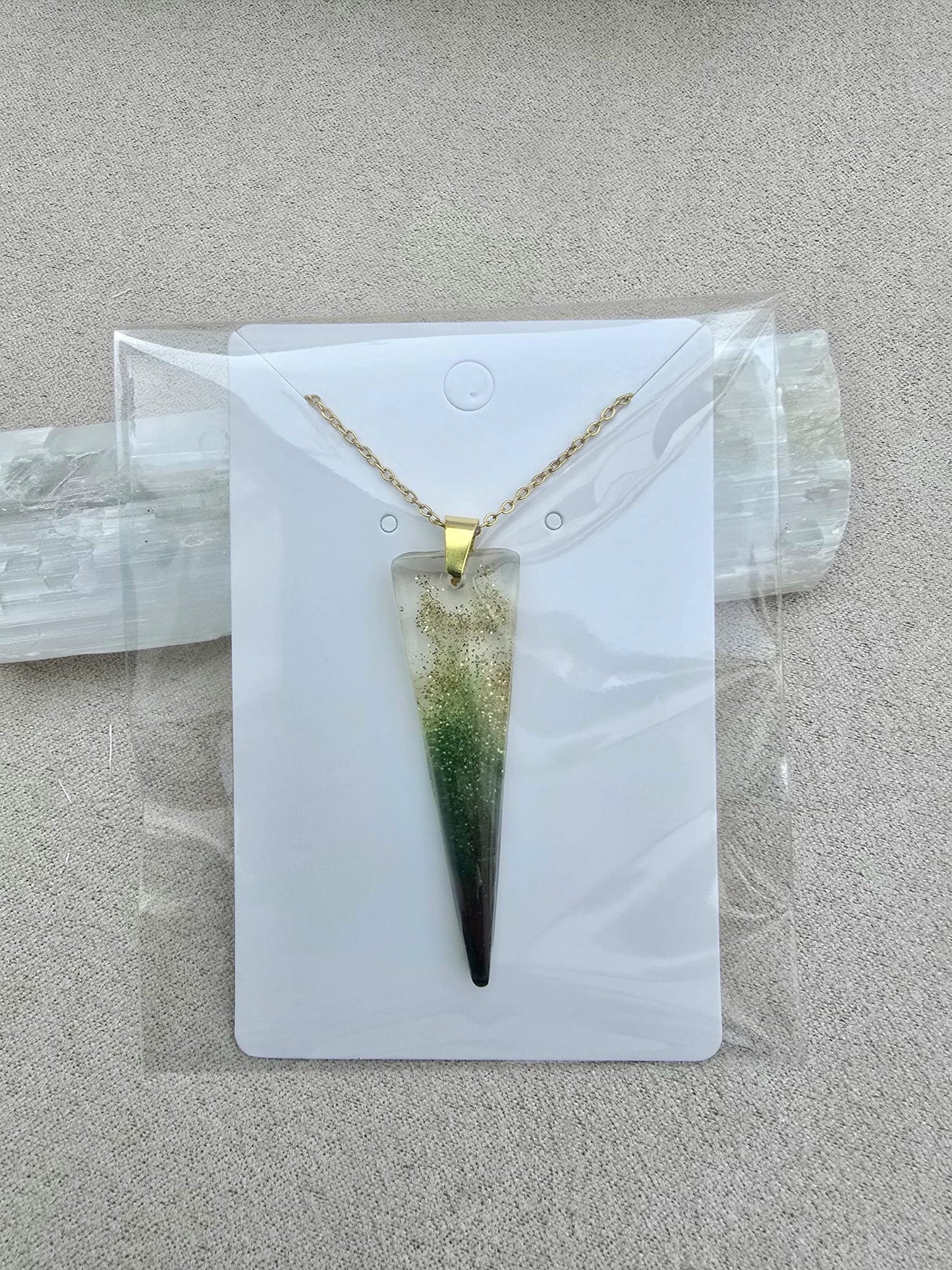Golden olive PENDULUM necklace.