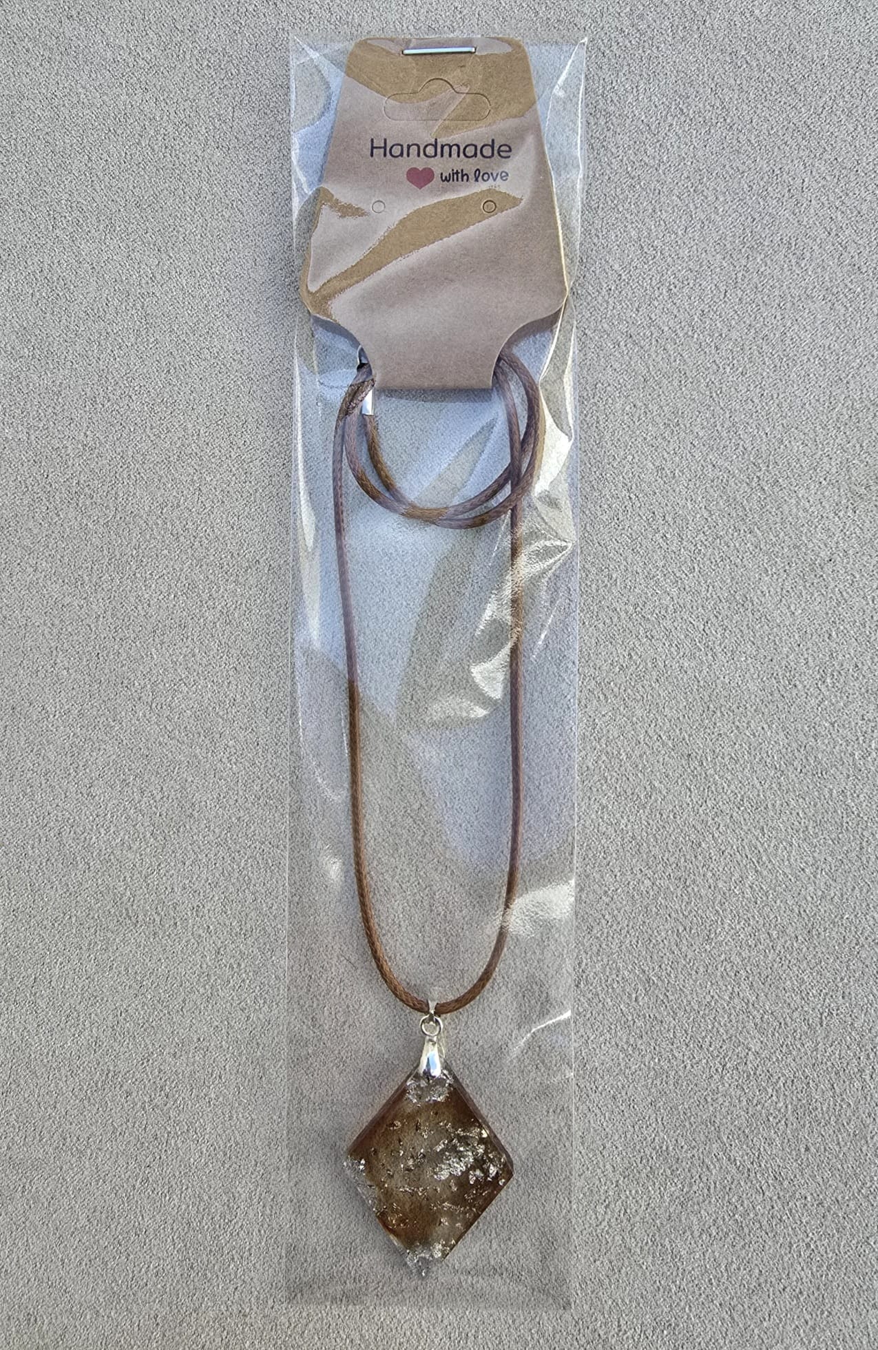 SMOKY RHOMBUS pendant.