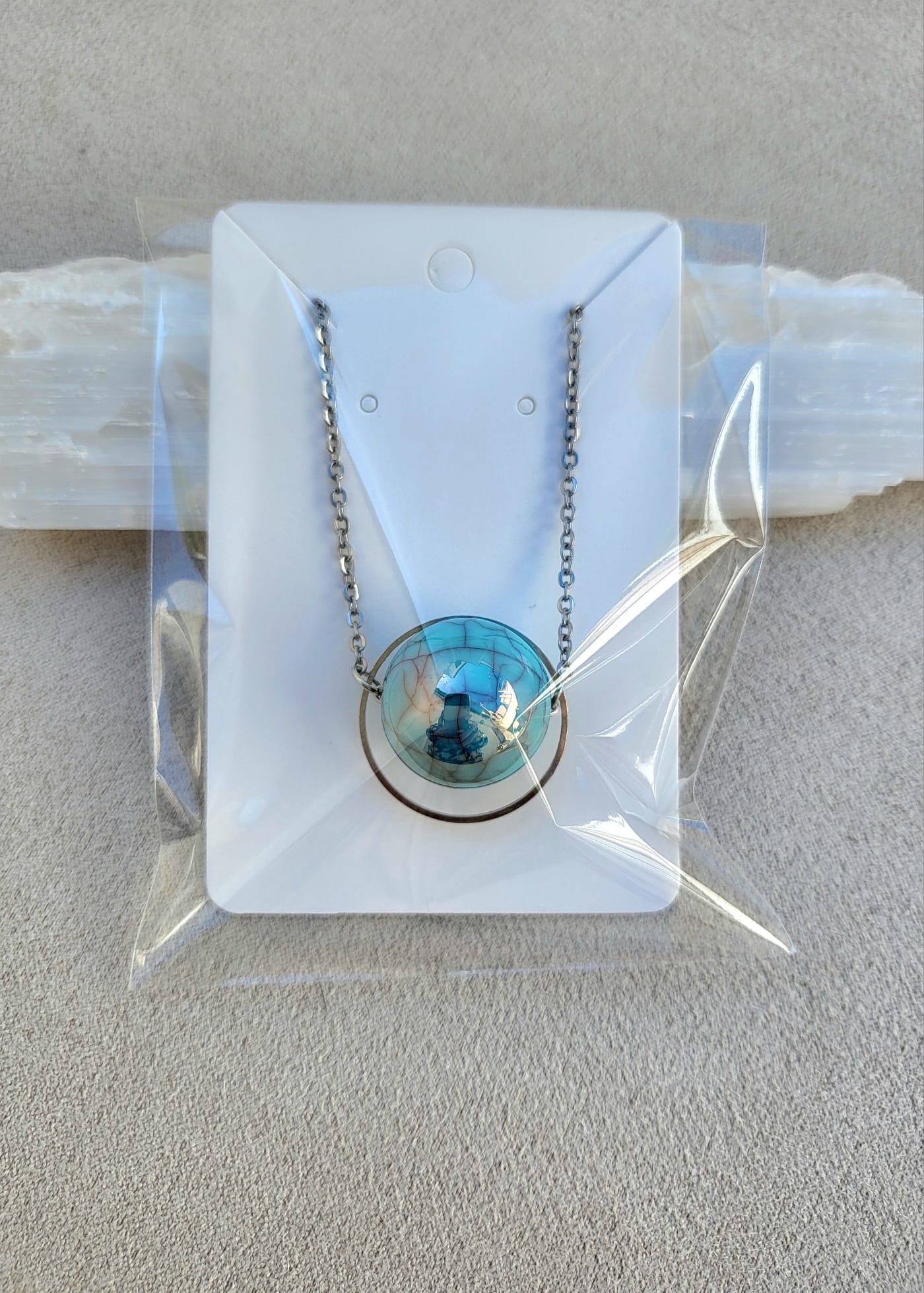 IN ORBIT turquoise necklace.