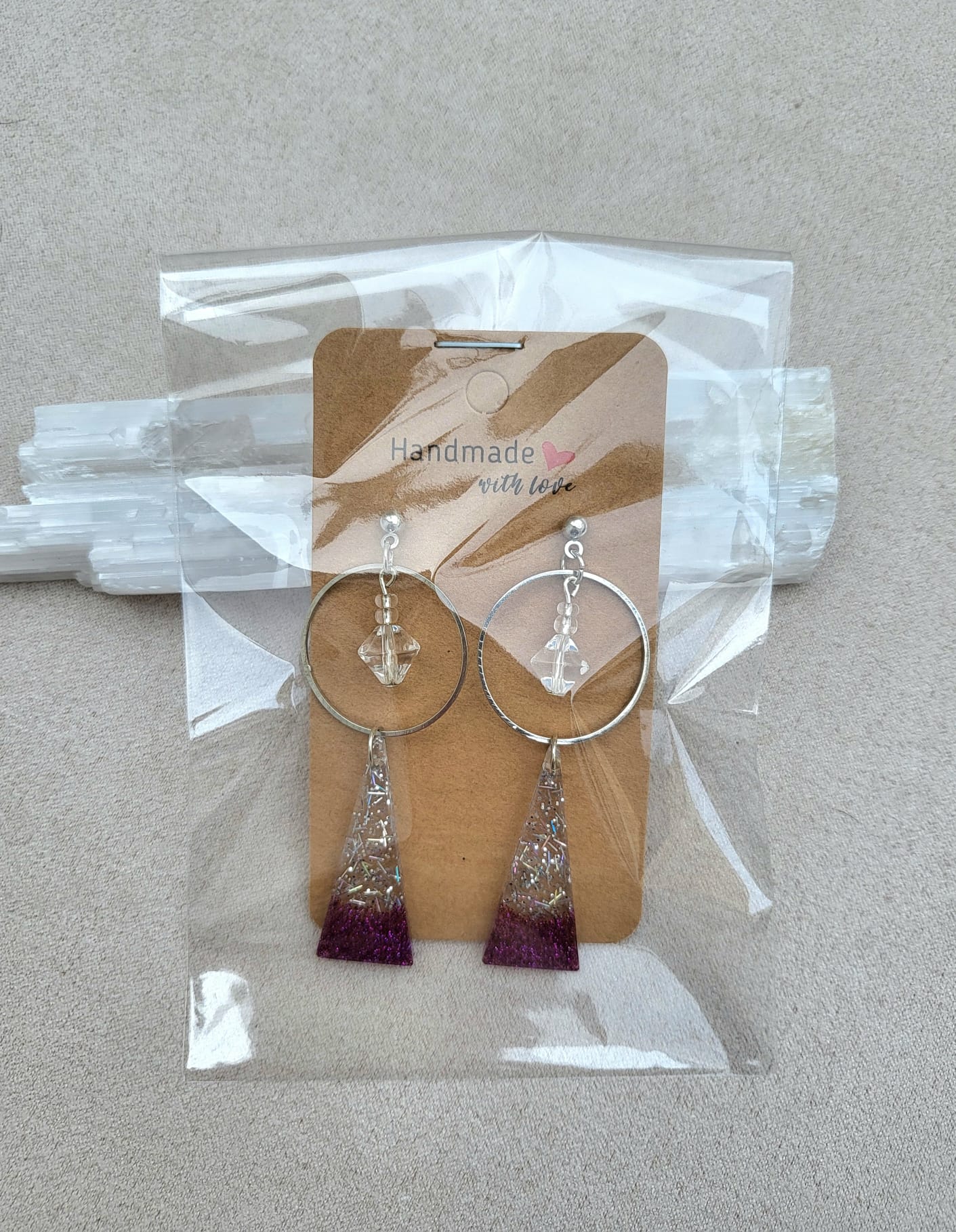 SIDEREAL FANTASY earrings.