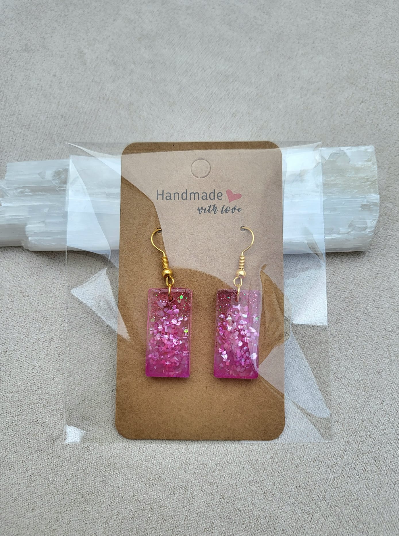 PINKY SQUARE earrings.