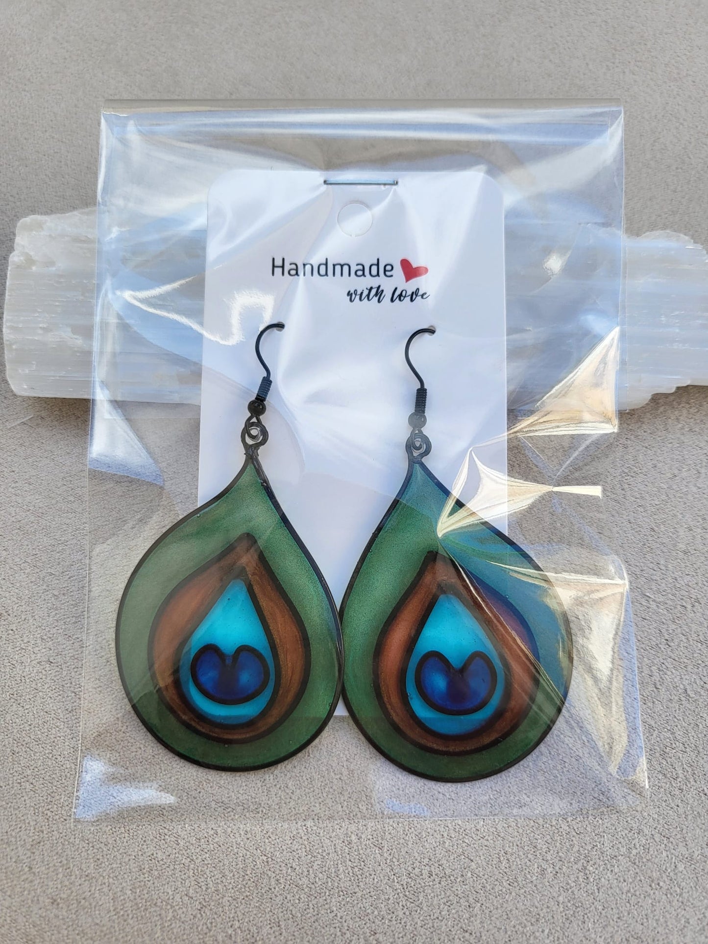 REAL SILHOUETTE earrings.