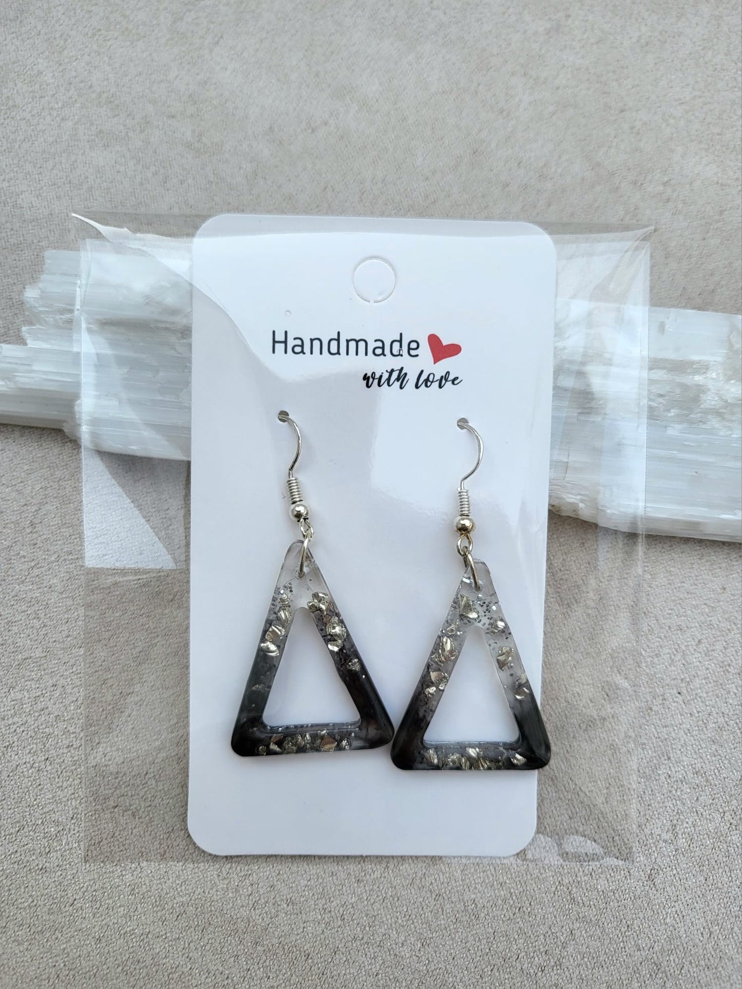 SILVER SMOKE earrings.