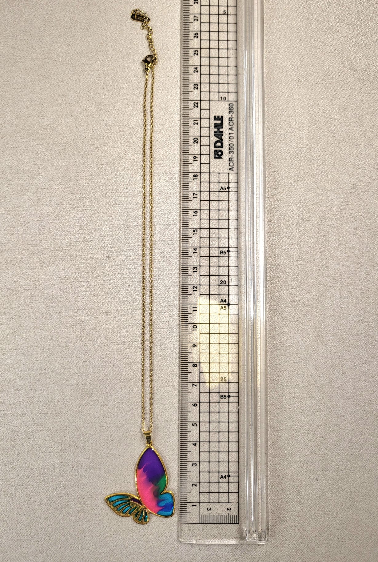 PRISM BUTTERFLY necklace.